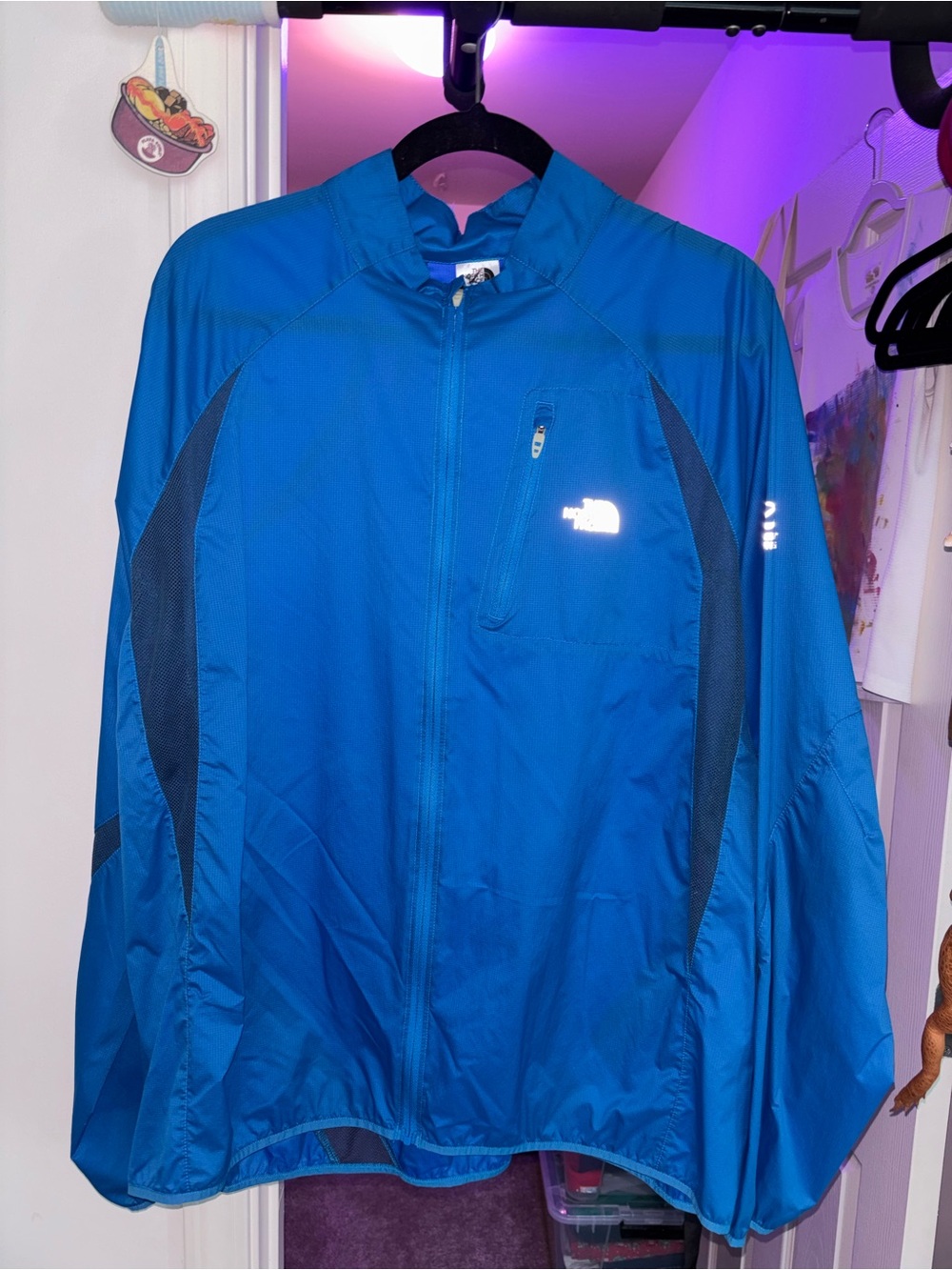 The North Face Men's Bright Blue Windbreaker with Dark Blue Panels